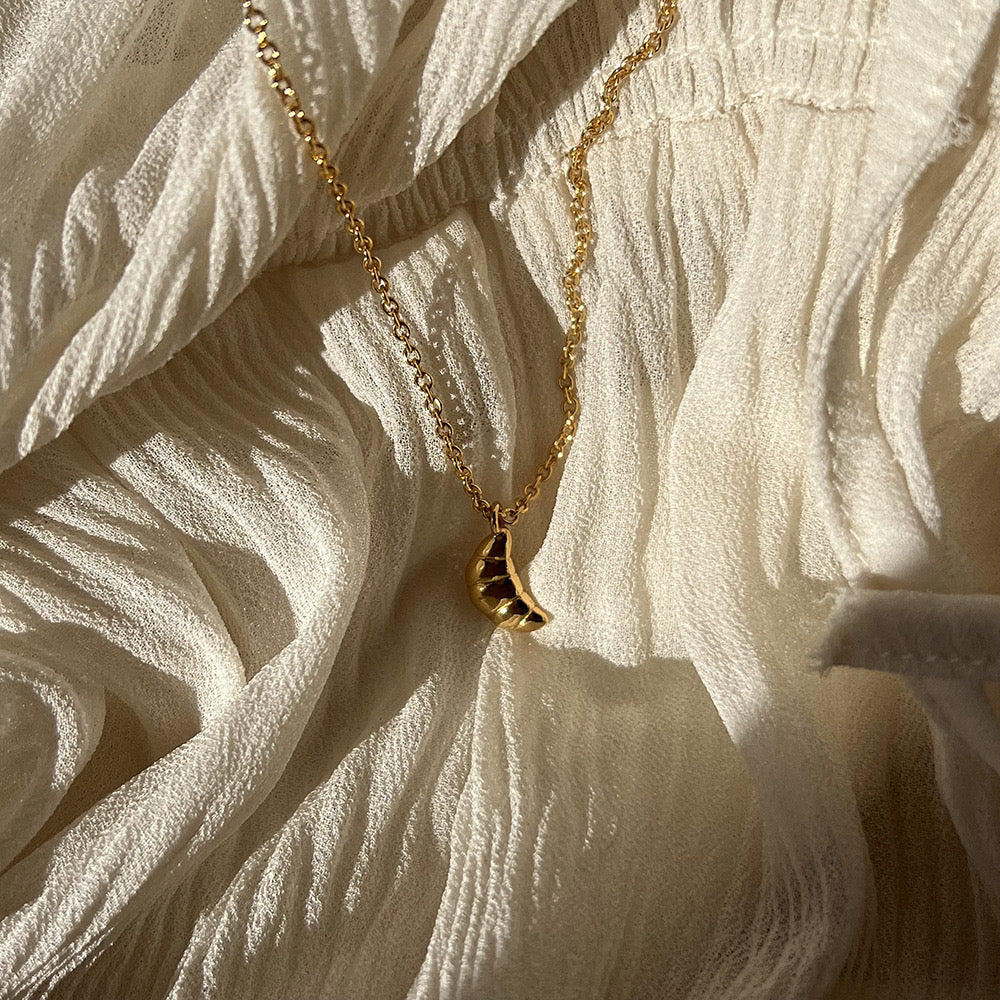 Croissant Necklace In Gold