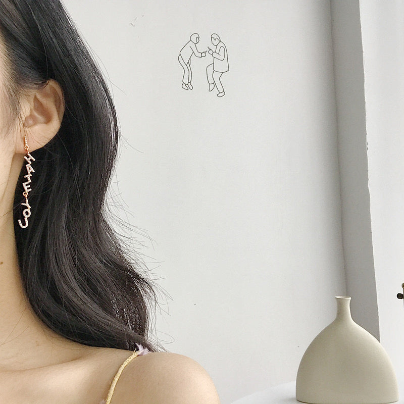 I Love You I Hate You Letter Drop Earrings In Champagne Gold